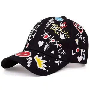 Be Yourself Graffiti Baseball Cap boater hat with bow in beach sunlight