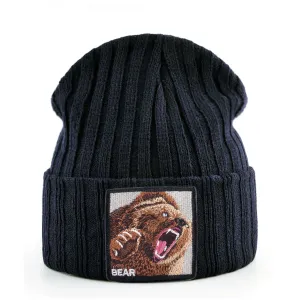 Bear Knitted Beanie boater hat with bow in beach sunlight