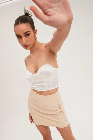 Beige Corset Mini Skirt,skirt,denim skirt,mini skirt,maxi skirt,jean skirt,skort,tennis skirt,pleated skirt,pencil skirt,bubble skirt,plisse skirt,fitted skirt,midi skirt,short skirt,short mini skirt,leather skirt,a line skirt,Split skirt