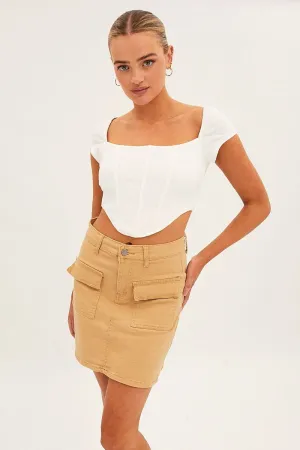 Beige High Rise Cargo Mini Denim Skirt,skirt,denim skirt,mini skirt,maxi skirt,jean skirt,skort,tennis skirt,pleated skirt,pencil skirt,bubble skirt,plisse skirt,fitted skirt,midi skirt,short skirt,short mini skirt,leather skirt,a line skirt
