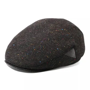 Bellevue Herringbone Wool Flat Cap boater hat with bow in beach sunlight