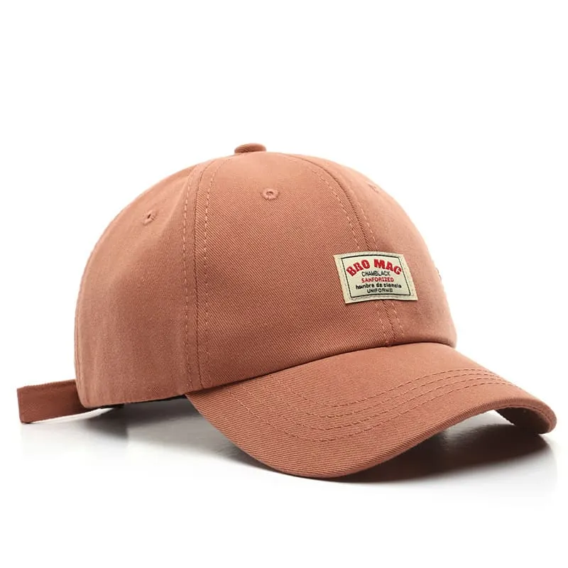 Bro Mac Cotton Baseball Cap boater hat with bow in beach sunlight