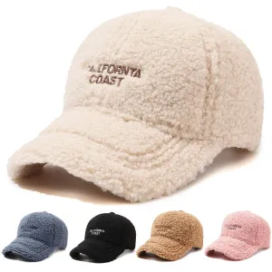 California Coast Furry Baseball Cap boater hat with bow in beach sunlight