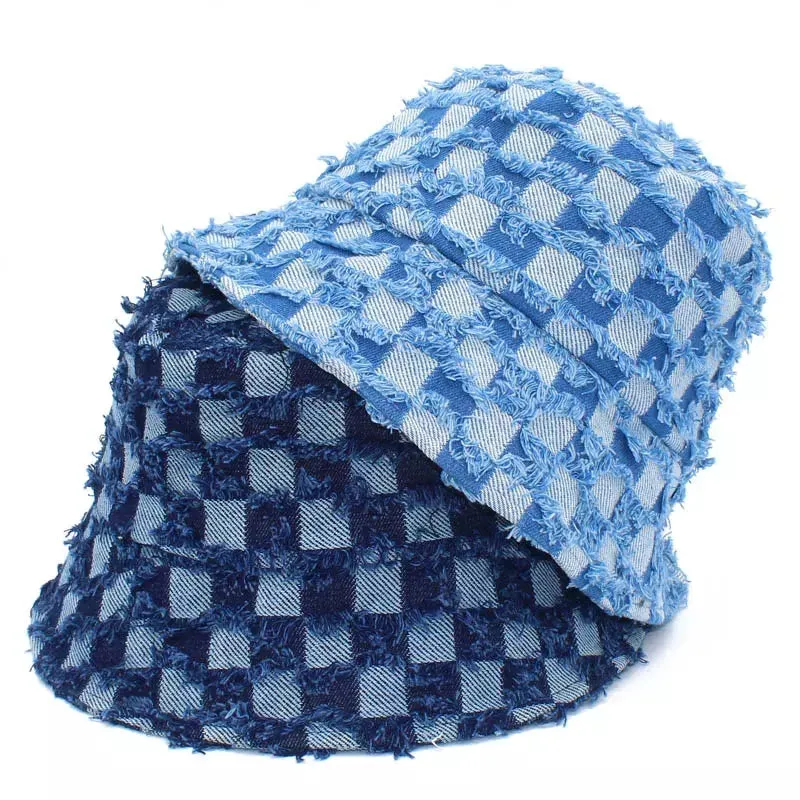 Deacon Denim Bucket Hat boater hat with bow in beach sunlight