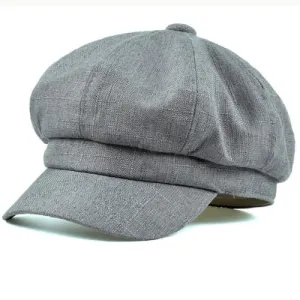 Genova Plain Linen Newsboy Cap stylish boater hat with ribbon on model