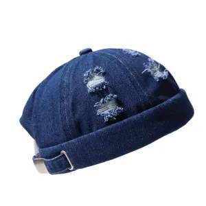 Ghelter Ripped Denim Docker Cap boater hat with bow in beach sunlight