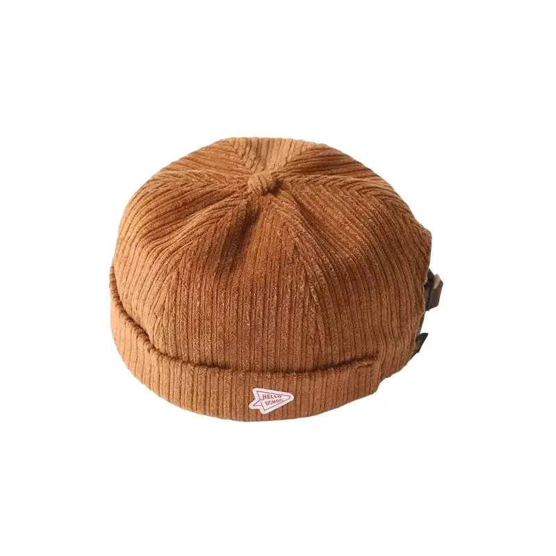 Hello Domog Corduroy Docker Cap boater hat with bow in beach sunlight