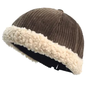 Himalayan Winter Corduroy Docker Cap boater hat with bow in beach sunlight