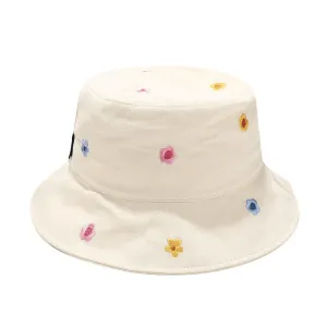 Kirsten Flowers Bucket Hat stylish boater hat with ribbon on model