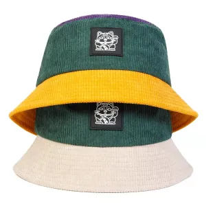 Lucky Cat Corduroy Bucket Hat boater hat with bow in beach sunlight