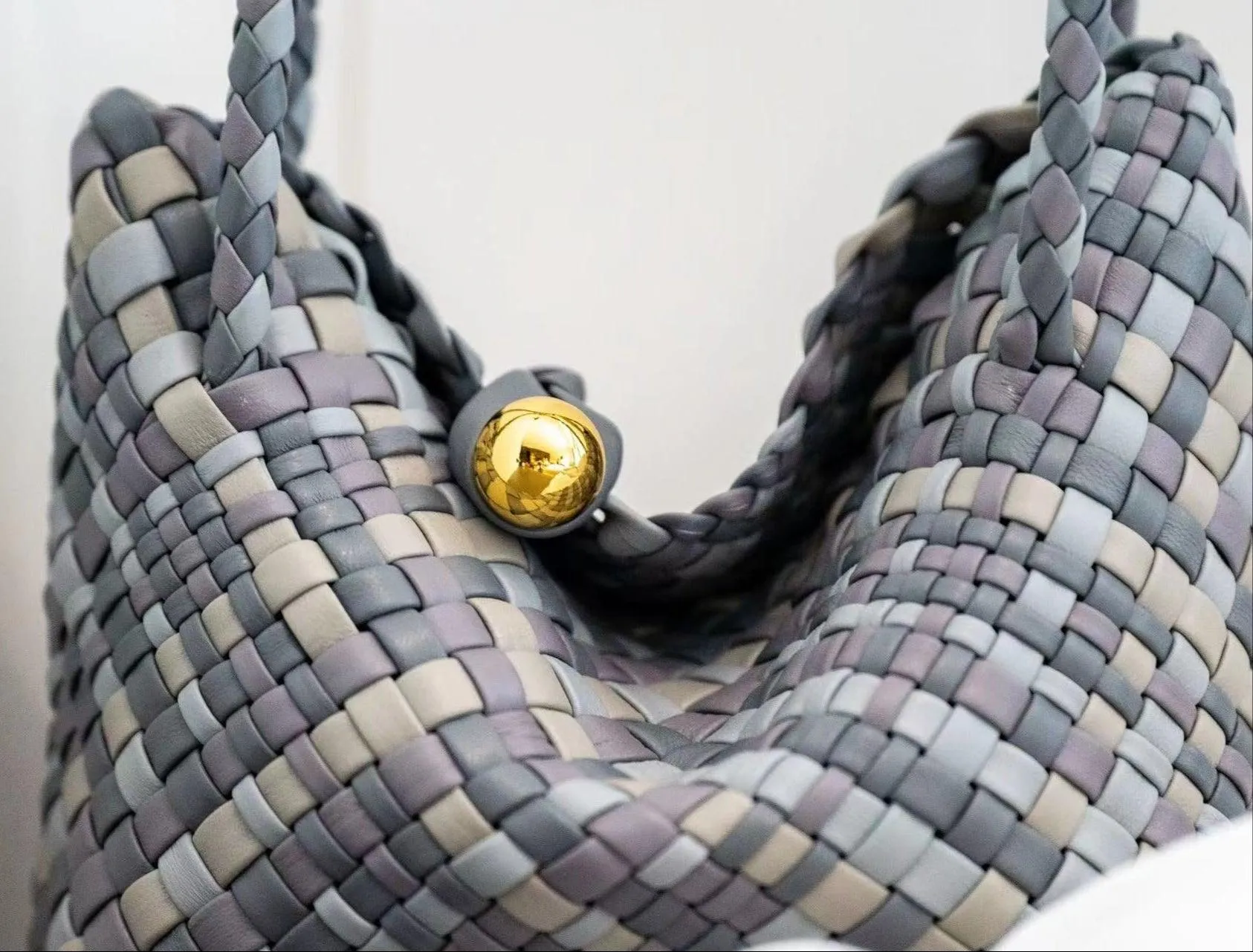 Luxury Handwoven Lambskin Leather Shoulder Bucket Bag with Sculptural Gold Sphere Closure and Double Handle Design ?C Spacious & Versatile Carryall