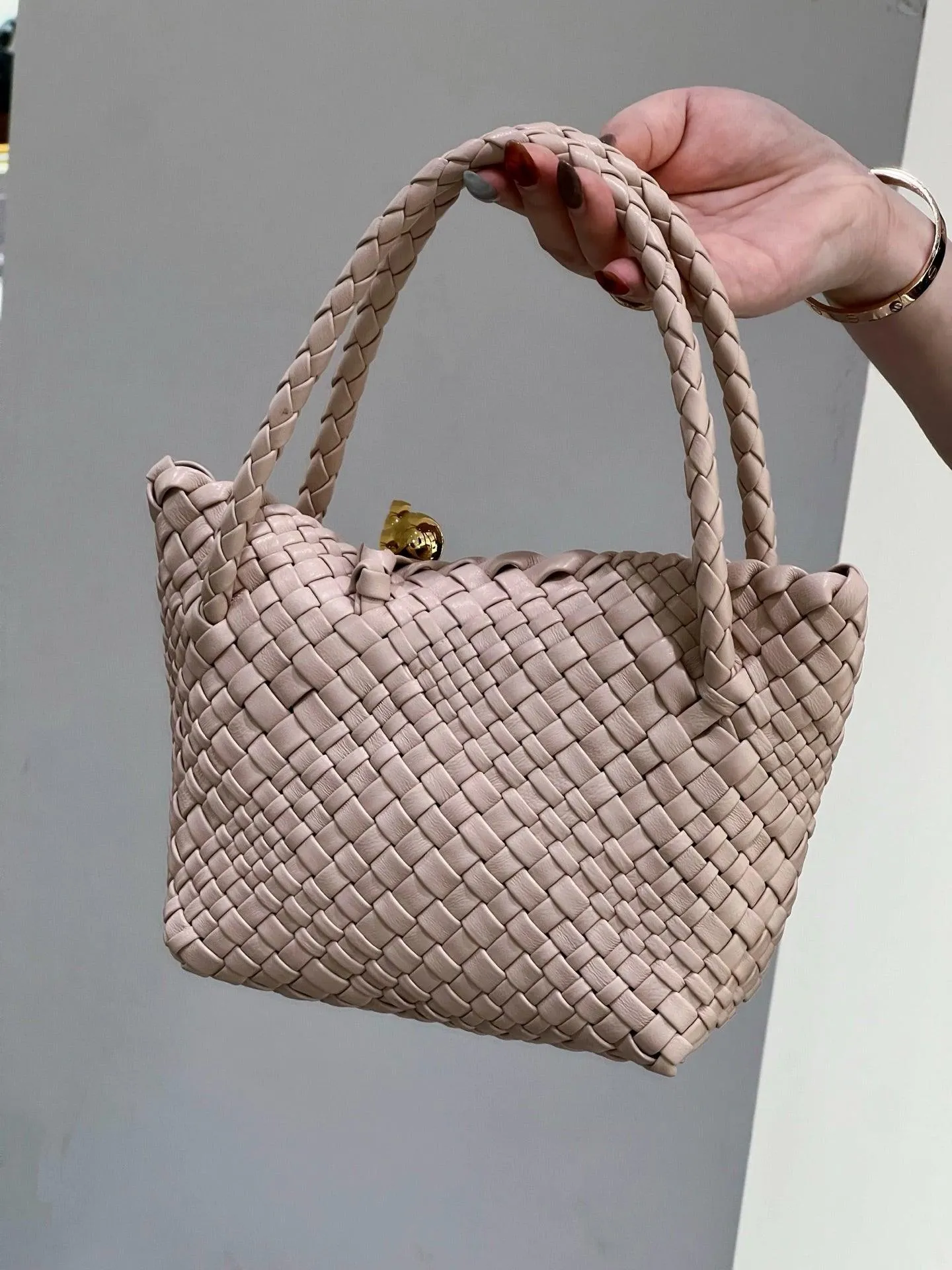 Luxury Handwoven Lambskin Leather Shoulder Bucket Bag with Sculptural Gold Sphere Closure and Double Handle Design ?C Spacious & Versatile Carryall
