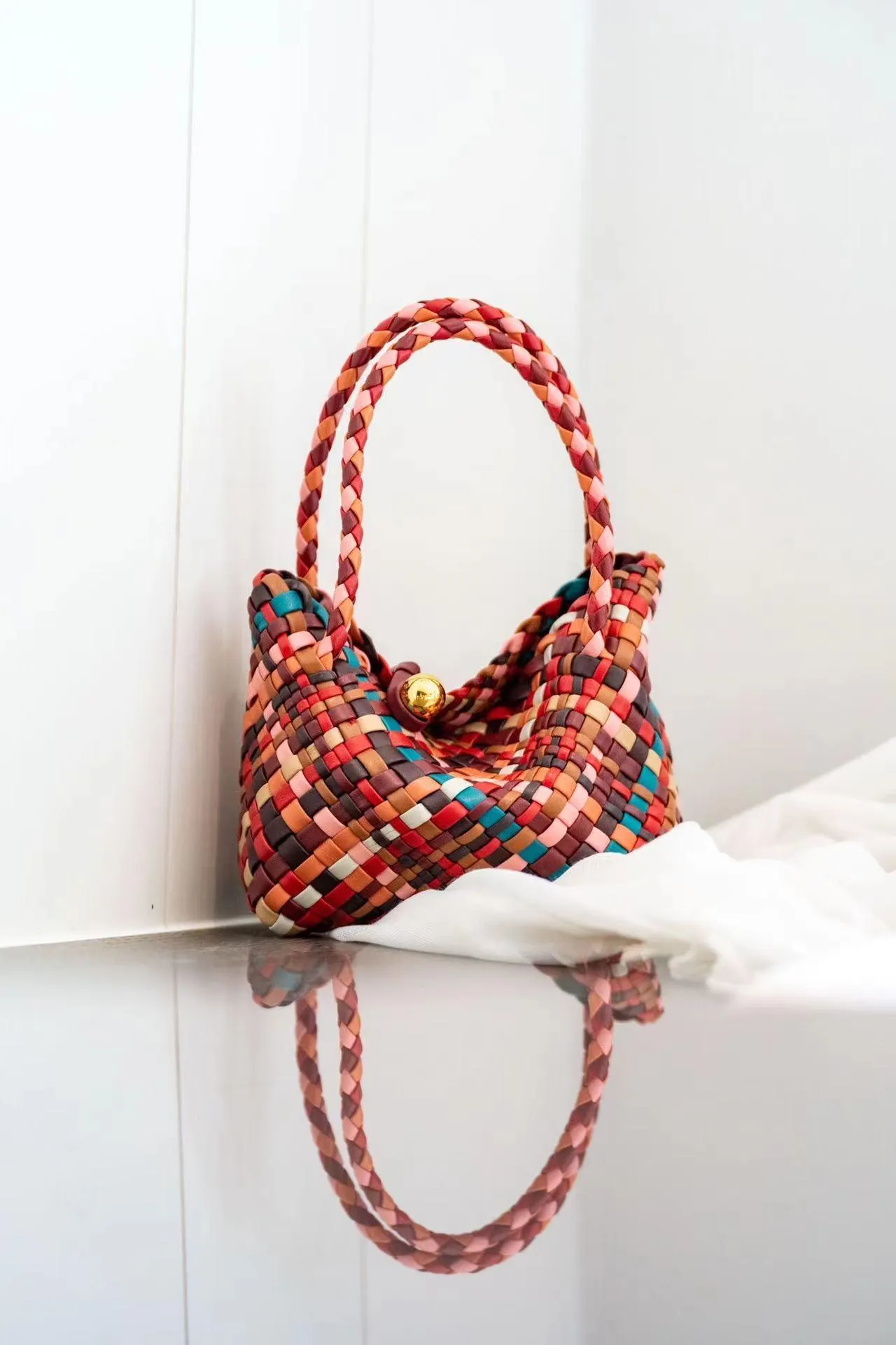 Luxury Handwoven Lambskin Leather Shoulder Bucket Bag with Sculptural Gold Sphere Closure and Double Handle Design ?C Spacious & Versatile Carryall