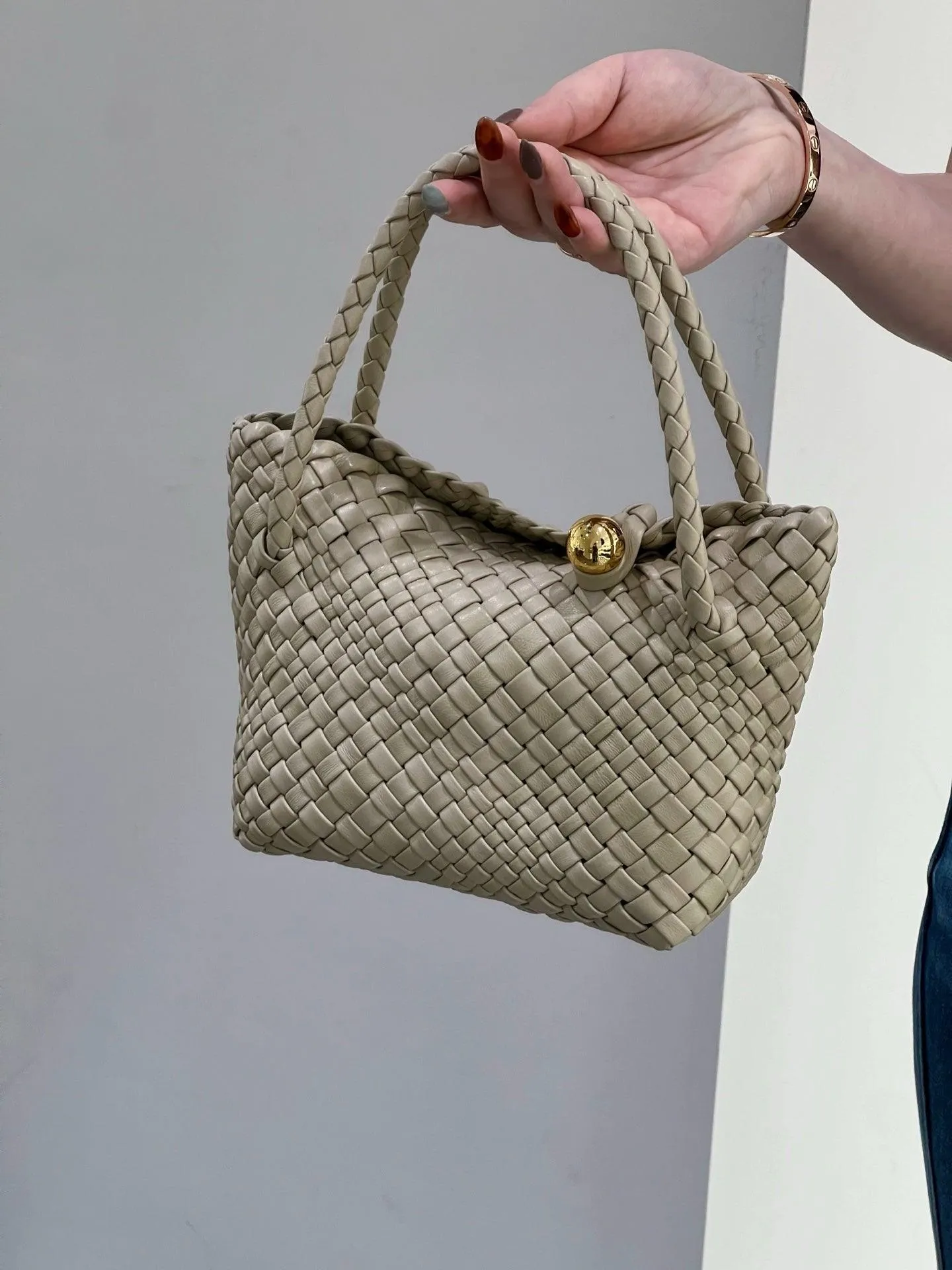 Luxury Handwoven Lambskin Leather Shoulder Bucket Bag with Sculptural Gold Sphere Closure and Double Handle Design ?C Spacious & Versatile Carryall