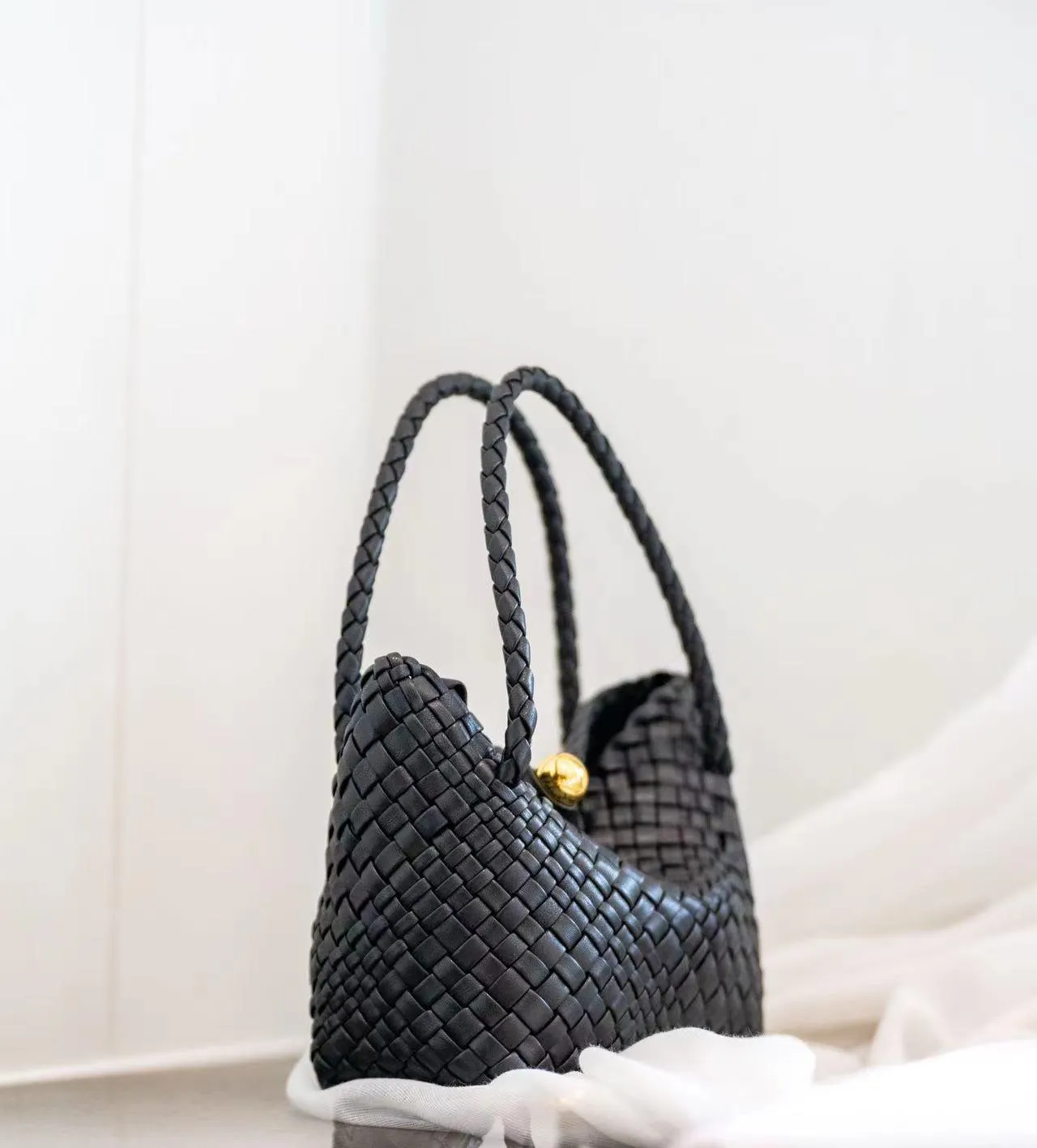 Luxury Handwoven Lambskin Leather Shoulder Bucket Bag with Sculptural Gold Sphere Closure and Double Handle Design ?C Spacious & Versatile Carryall