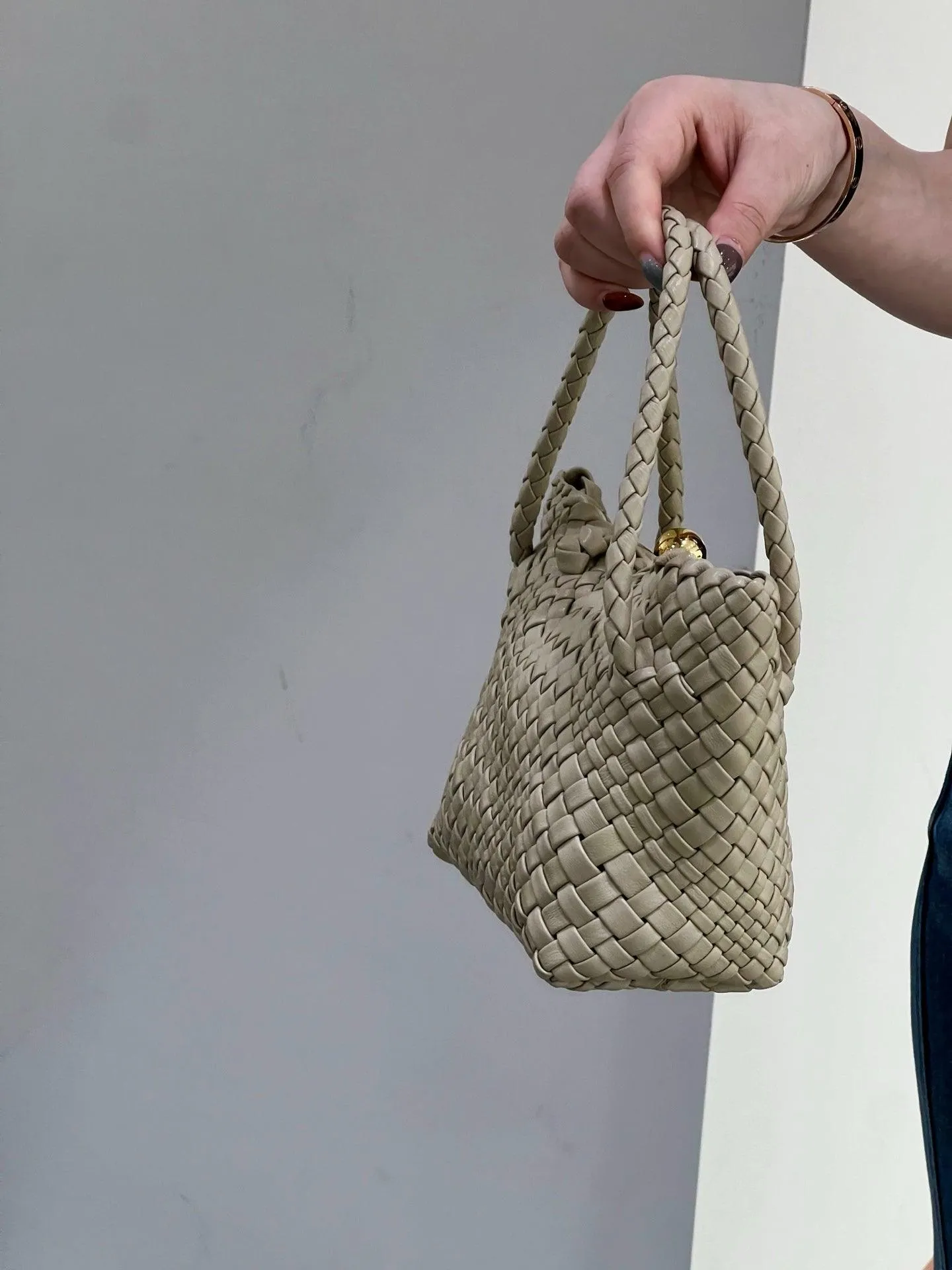 Luxury Handwoven Lambskin Leather Shoulder Bucket Bag with Sculptural Gold Sphere Closure and Double Handle Design ?C Spacious & Versatile Carryall