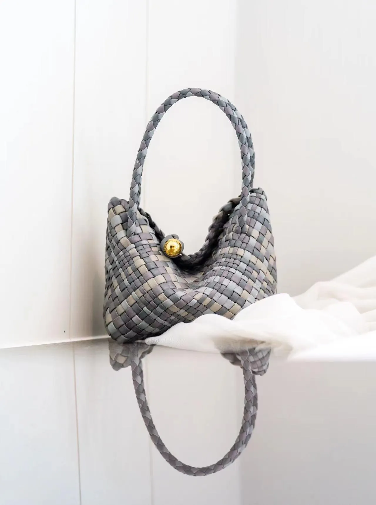 Luxury Handwoven Lambskin Leather Shoulder Bucket Bag with Sculptural Gold Sphere Closure and Double Handle Design ?C Spacious & Versatile Carryall