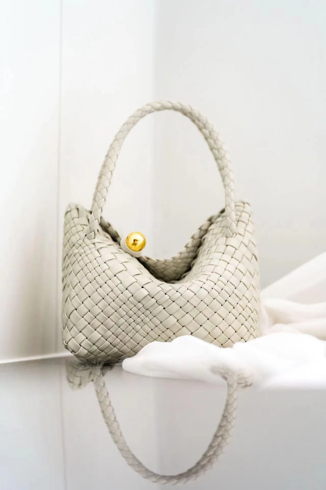 Luxury Handwoven Lambskin Leather Shoulder Bucket Bag with Sculptural Gold Sphere Closure and Double Handle Design ?C Spacious & Versatile Carryall