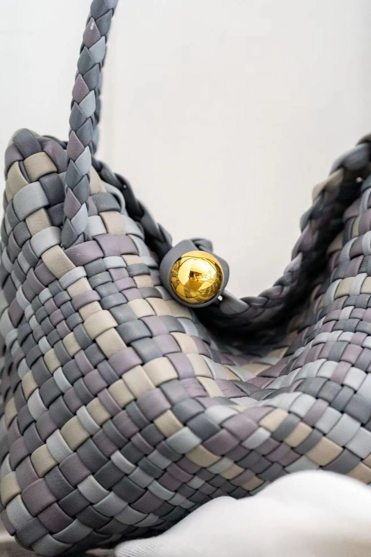 Luxury Handwoven Lambskin Leather Shoulder Bucket Bag with Sculptural Gold Sphere Closure and Double Handle Design ?C Spacious & Versatile Carryall