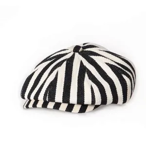 Marbella Striped Newsboy Cap stylish boater hat with ribbon on model