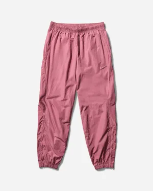 Men's NOCTA Woven Track Pants Desert Berry Men's sweatshirt