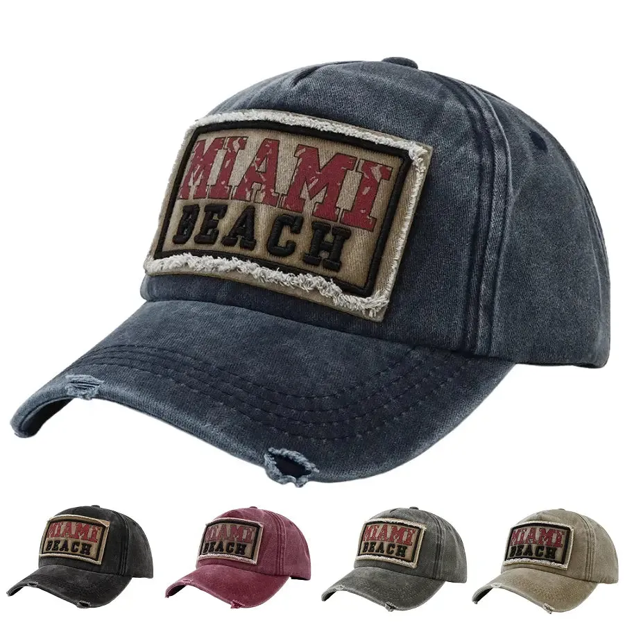 Miami Beach Washed Cotton Baseball Cap boater hat with bow in beach sunlight
