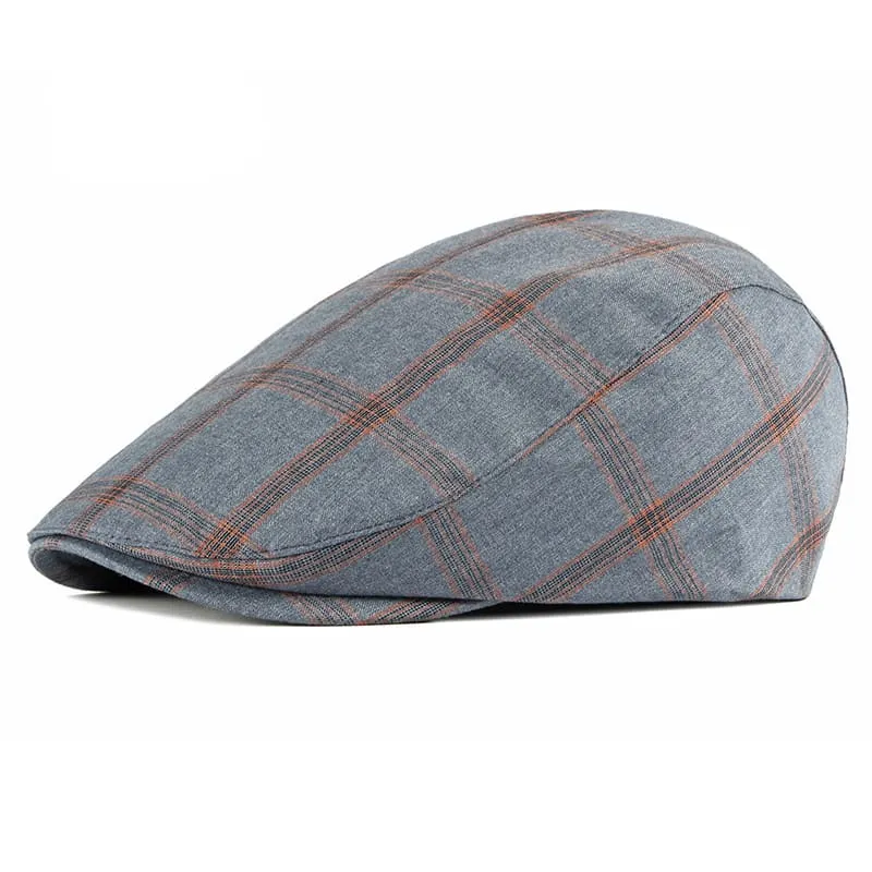 Monza Plaid Cotton Flat Cap boater hat with bow in beach sunlight