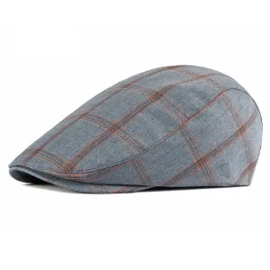 Monza Plaid Cotton Flat Cap boater hat with bow in beach sunlight