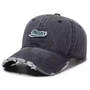 Nanx Distressed Baseball Cap boater hat with bow in beach sunlight