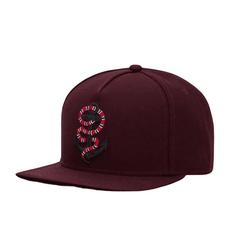 Snake & Anchor Snapback Cap boater hat with bow in beach sunlight