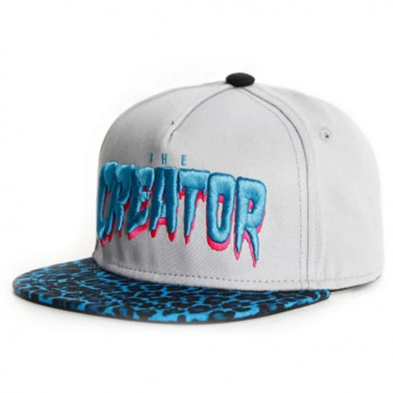 The Creator Snapback Cap boater hat with bow in beach sunlight