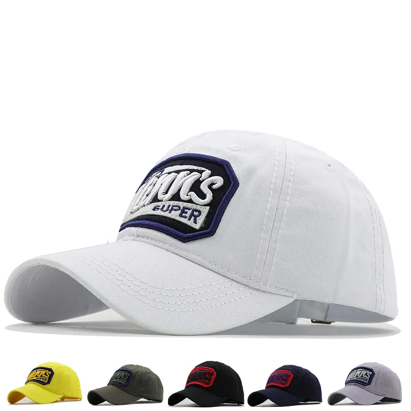 The Mann's Super Baseball Cap boater hat with bow in beach sunlight