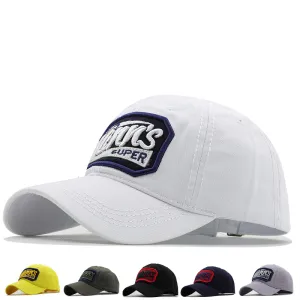 The Mann's Super Baseball Cap boater hat with bow in beach sunlight
