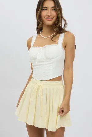 Yellow Mini Skirt Elastic Waist Volume Textured Cotton,skirt,denim skirt,mini skirt,maxi skirt,jean skirt,skort,tennis skirt,pleated skirt,pencil skirt,bubble skirt,plisse skirt,fitted skirt,midi skirt,short skirt,short mini skirt,leather skirt,a line skir