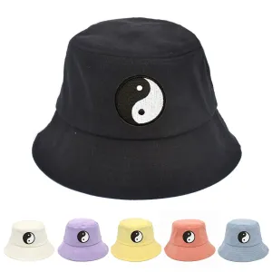 Yin Yang Cotton Bucket Hat boater hat with bow in beach sunlight